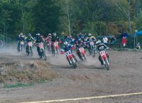 Photos of me racing my 2002 YZ 250 in 2003 first turn