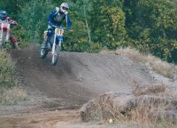 Photos of me racing my 2002 YZ 250 in 2003 about to land
