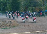 Photos of me racing my 2002 YZ 250 in 2003 first turn
